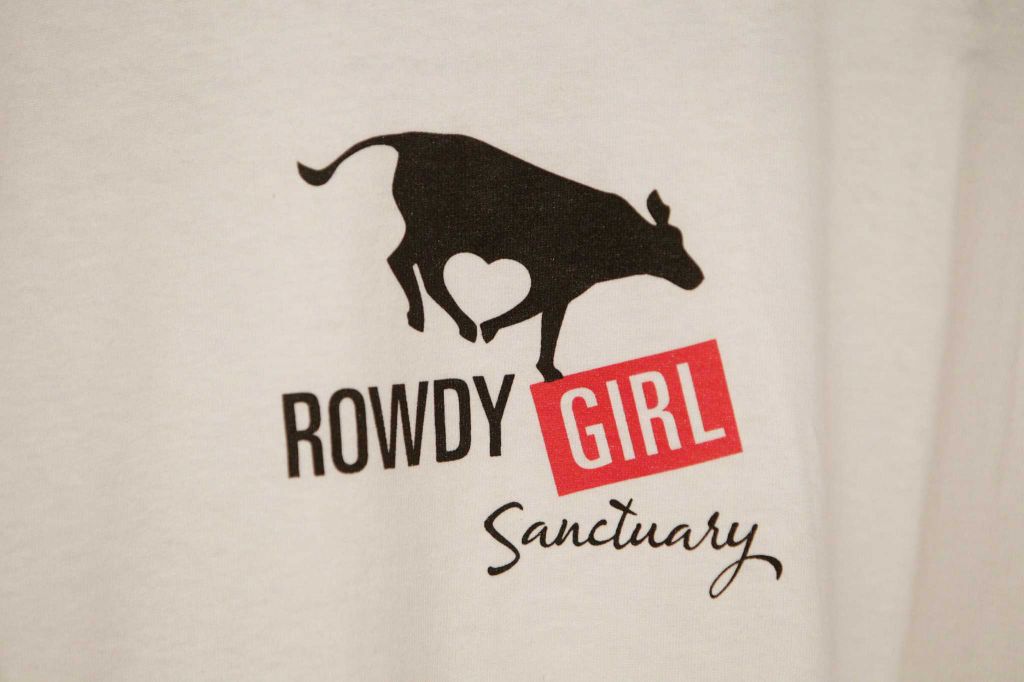The logo for the Rowdy Girl Sanctuary on a T-shirt Tuesday, Jan. 26, 2016, in Angleton. The vegan farm sanctuary is run by King-Sonnen, who recently bought a herd of cattle from her husband in an effort to rescue the cows from slaughter. Now, the sanctuary is home to 48 cows, 7 chicken, a turkey, 4 horses and 4 pigs, who get to stay on the 96-acre lot in a sort of spa-retirement setting. While some of the cows were rescued locally, including the many from her husband's herd, there are new additions coming in from as far away as Florida, as King-Sonnen works to disrupt the traditional farming system that she feels is cruel to animals. ( Steve Gonzales / Houston Chronicle )