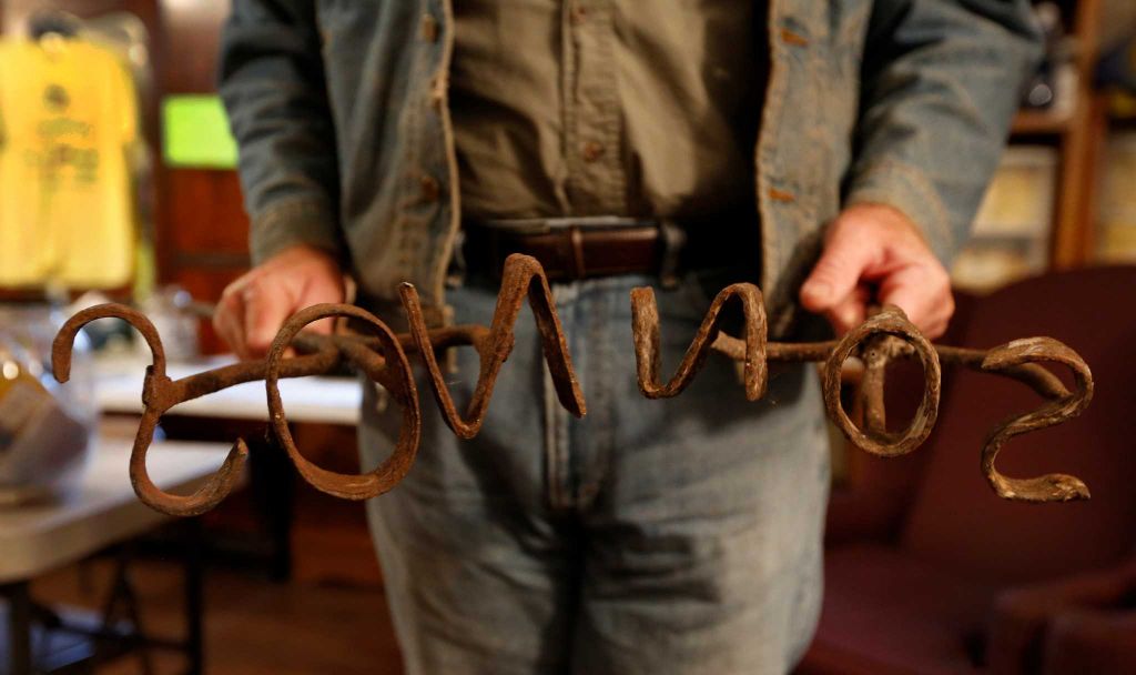 Houston Chronicle Story-26 Tommy with his great-grandfather's branding irons