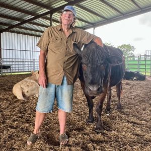 Wrinkly-and-Tommy Tommy with arm around Wrinkly