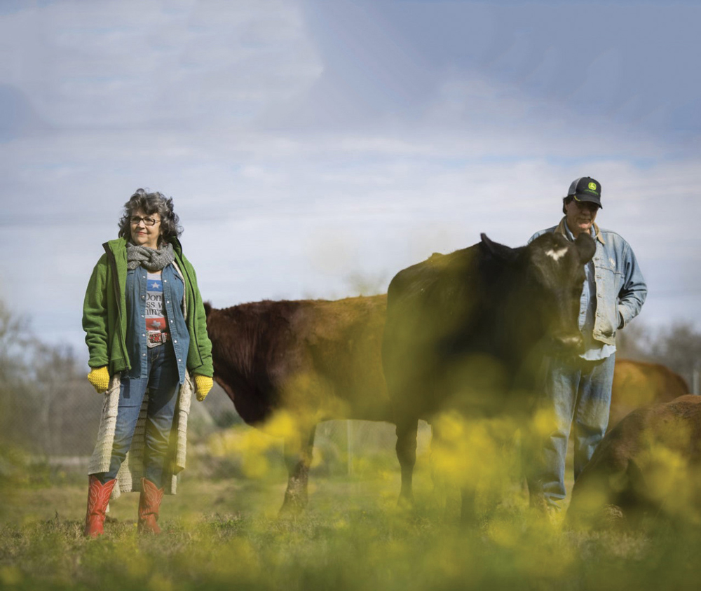 Renee and Tommy standing with Rowdy Girl