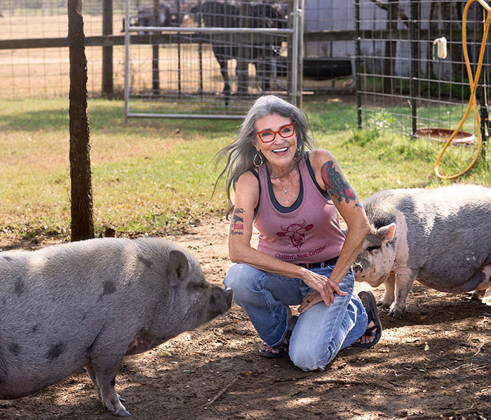 02-6a73a2f0a85fd__700 Renee with Pot Belly pigs